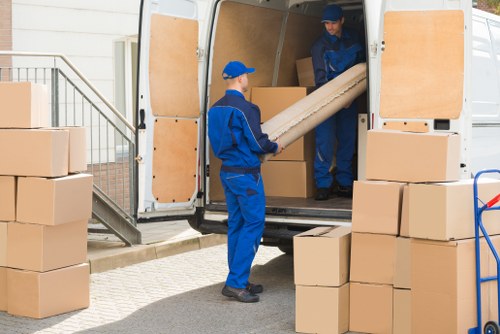 Removal van and moving boxes near St Pancras homes