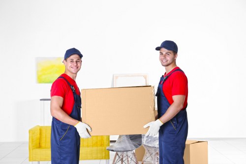 Removal team preparing a move in St Pancras near a central London apartment building